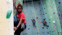 Rock climbers help refugees in America learn skills for the challenges of their new lives