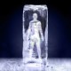 An ice cube with a person inside of it.