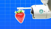 a robot is holding a strawberry on a blue background.