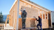 construction workers building a house