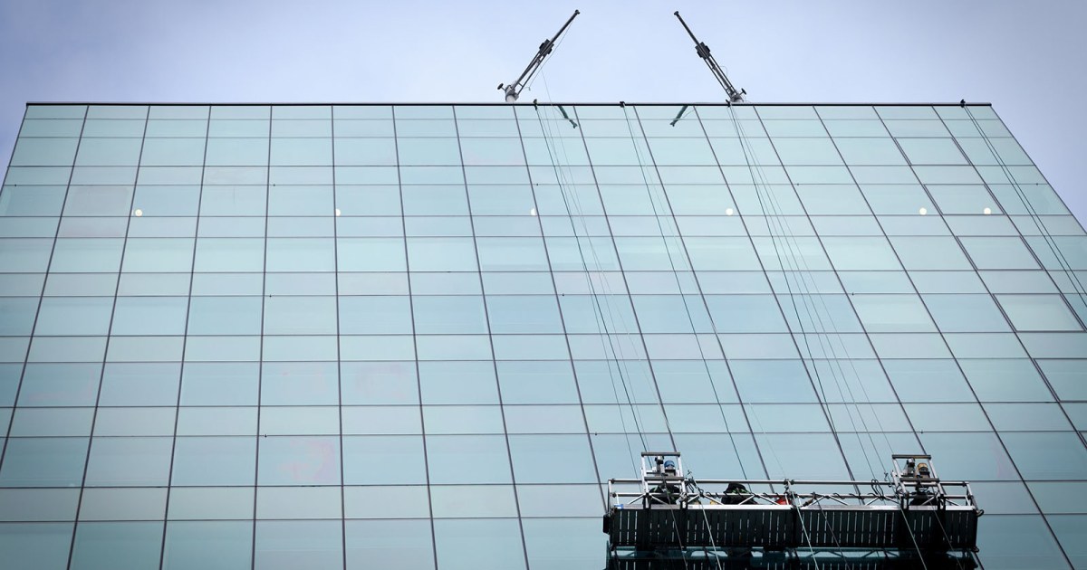 Watch Robotic window cleaners take to the sky