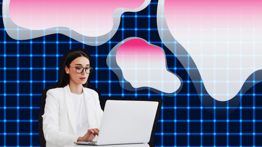 a person at a laptop over an abstract background