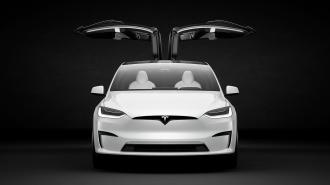 an image of a tesla from the front with its doors open