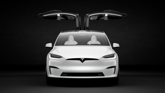 an image of a tesla from the front with its doors open