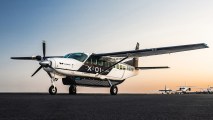 a plane at sunset