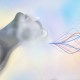 An abstract image of a woman's head with gamma waves incorporated.