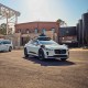two of waymo's autonomous cars in a lot