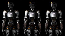 an image of three humanoid general purpose robots from the thighs up