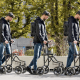 a man using a walker to take steps in an outdoor settin