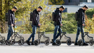 a man using a walker to take steps in an outdoor settin