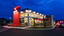 the exterior of a Wendy's restaurant at night