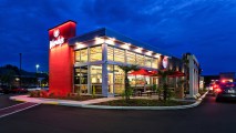 the exterior of a Wendy's restaurant at night