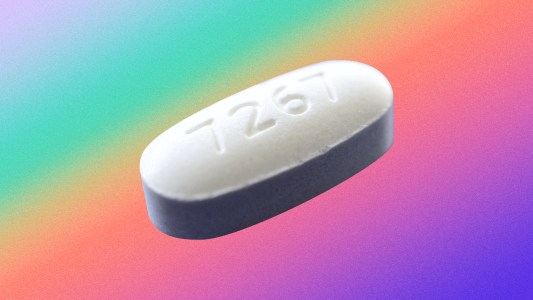 a white pill on a colorful background
