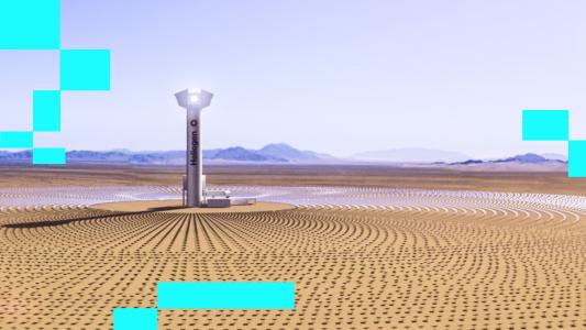 A solar tower in the middle of a desert.