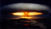 An image of an atomic bomb exploding over the ocean, inspired by HG Wells.
