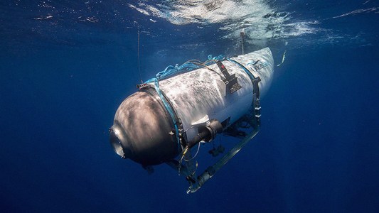 A submersible exploring the ocean depths with a sturdy rope to prevent implosion.