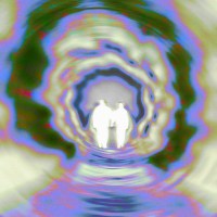 An image of two people walking through a tunnel.