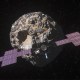 An artist's rendering of the Psyche mission spacecraft near 16 Psyche, an asteroid.