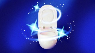 A white toilet with a blue background, featuring a slippery toilet bowl.