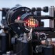 A machine with a red light attached to it.