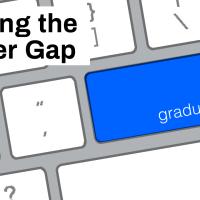 A blue button on a keyboard with the words closing the phd career gap.