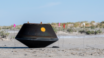 a charred capsule in the desert