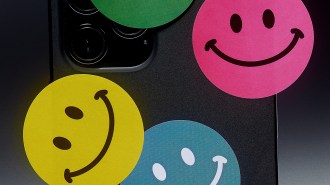 Colorful smiley face stickers for iPhone 11 to capture attention.