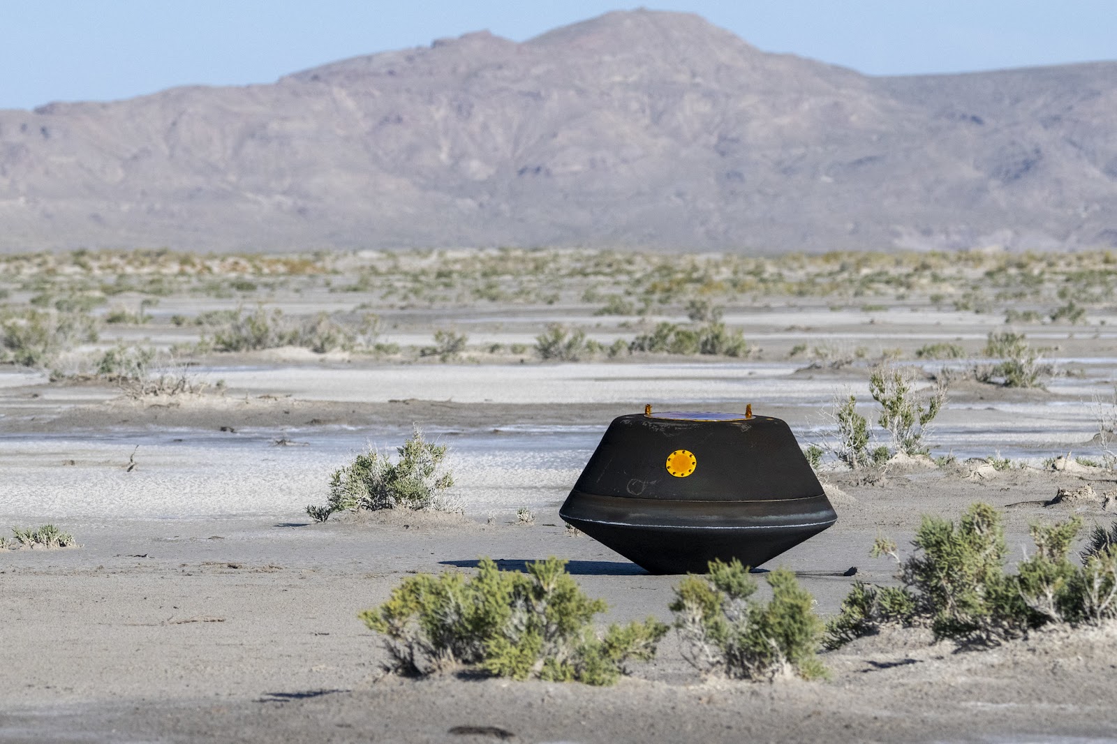 The sample return capsule from the OSIRIS-REx mission in the middle of the desert