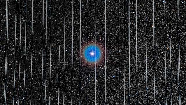 An image of a blue star in the sky.