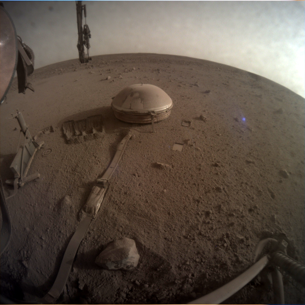 An image of Insight's seismometer, taken by the lander just prior to the end of its mission.