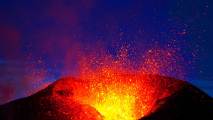 An awe-inspiring volcano in Iceland spewing fiery lava.