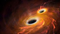 Two black holes exhibiting wave-particle duality in the middle of space.