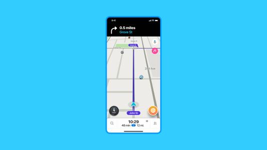 A phone displaying the Waze app's Crash History Alerts on a blue background