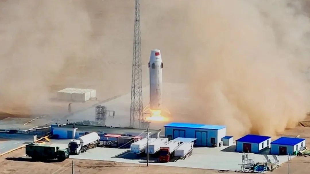 An aerial view of a rocket launch.