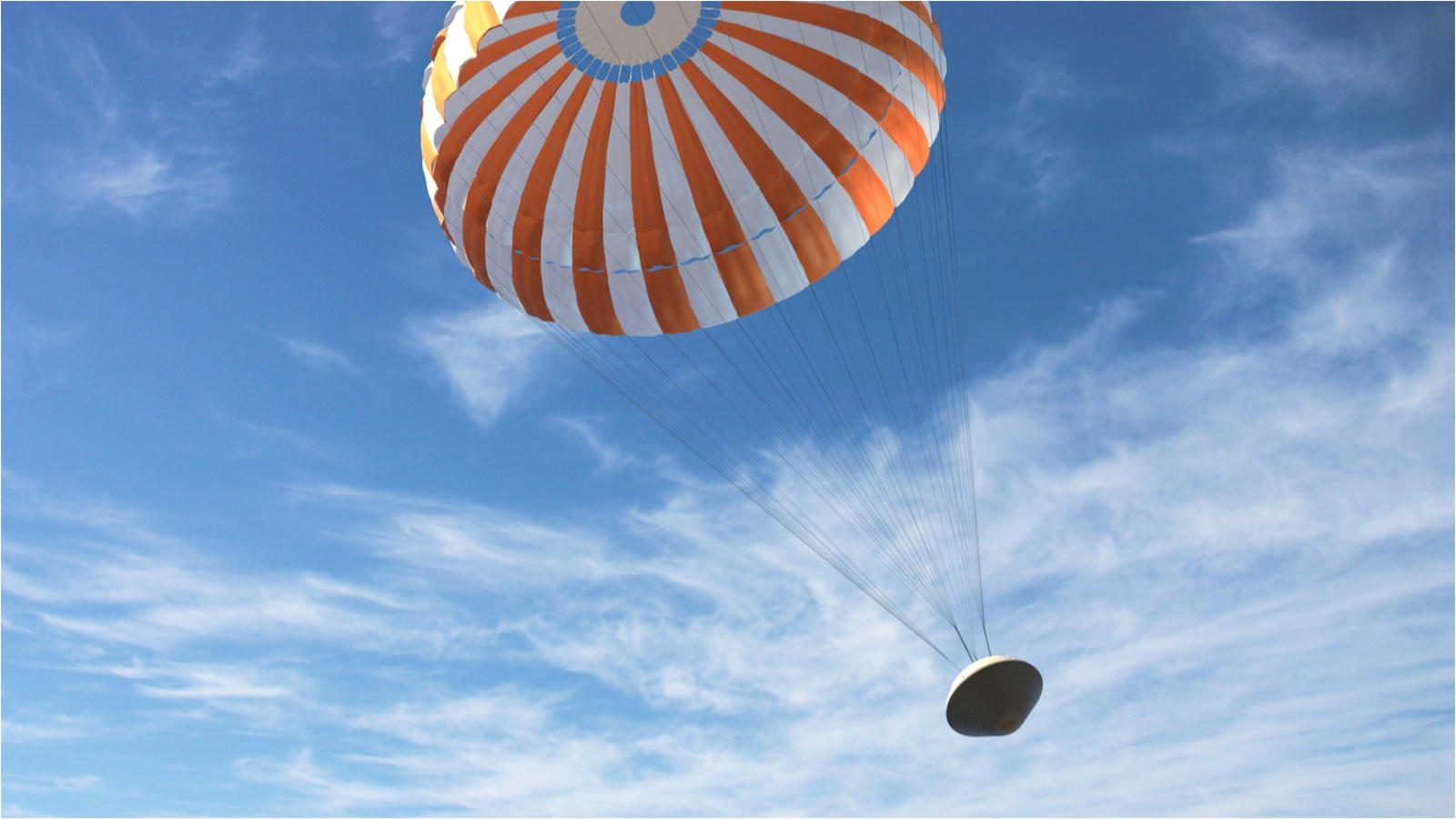 An orange and white parachute flying in the sky, lowering a capsule to the ground