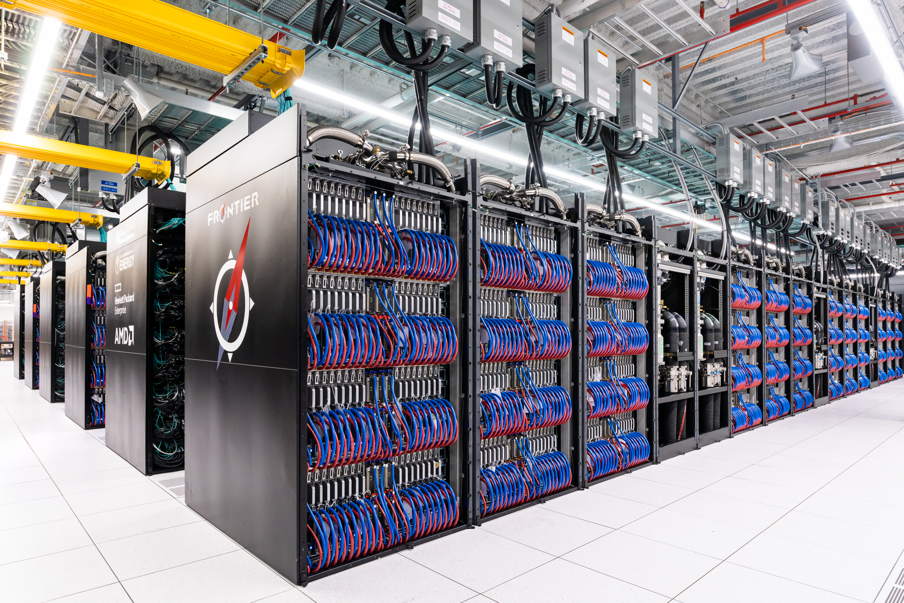 A large computer room with blue and blue wires.