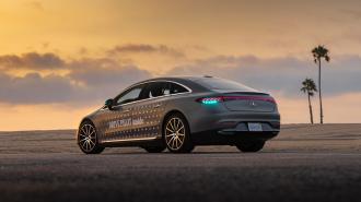 Mercedes-benz c-class electric car at sunset.