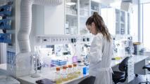 A woman working in a medical lab