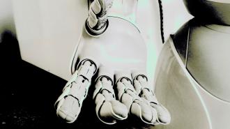 An image of a robot extending a hand out towards the viewer