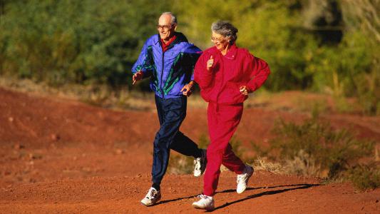 A man and a woman jogging.