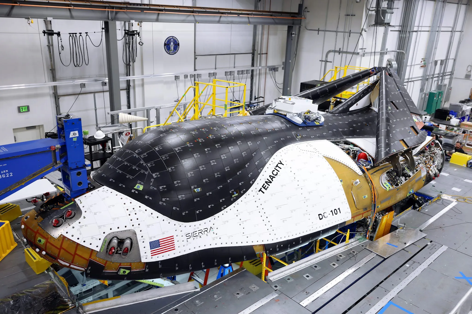 a Dream Chaser spacecraft in a warehouse
