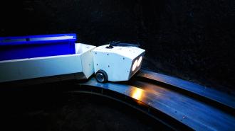 a train-like robot moving along an underground track