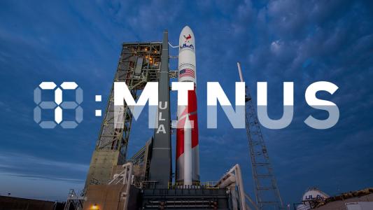 A rocket ready for liftoff with T-Minus logo over the image