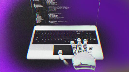 A laptop with an AI software engineer's hand on it.