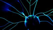 A close up of a brain with blue lights on it.