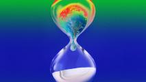 A colorful hourglass on a blue background symbolizes doomerism.