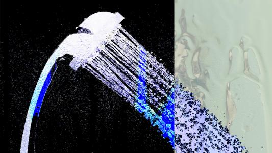 A stylized illustration of a shower head spraying water