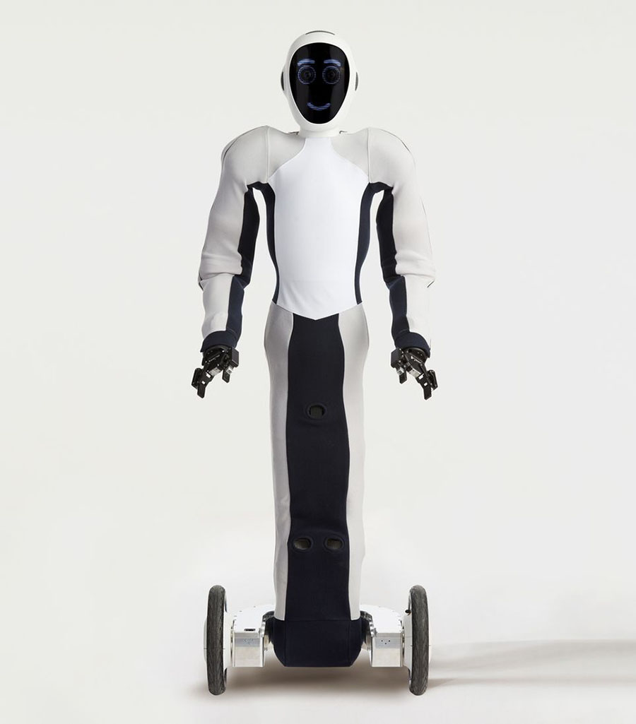 1X Technologies' humanoid robot Eve. It looks like it rolls on two wheels and has a friendly face.