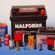 Various automotive products and battery types from brands like Halfords and Panasonic displayed on a light blue background.
