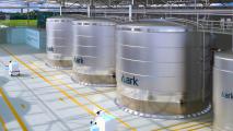 a rendering of three massive silver containers with "Ark" written on them